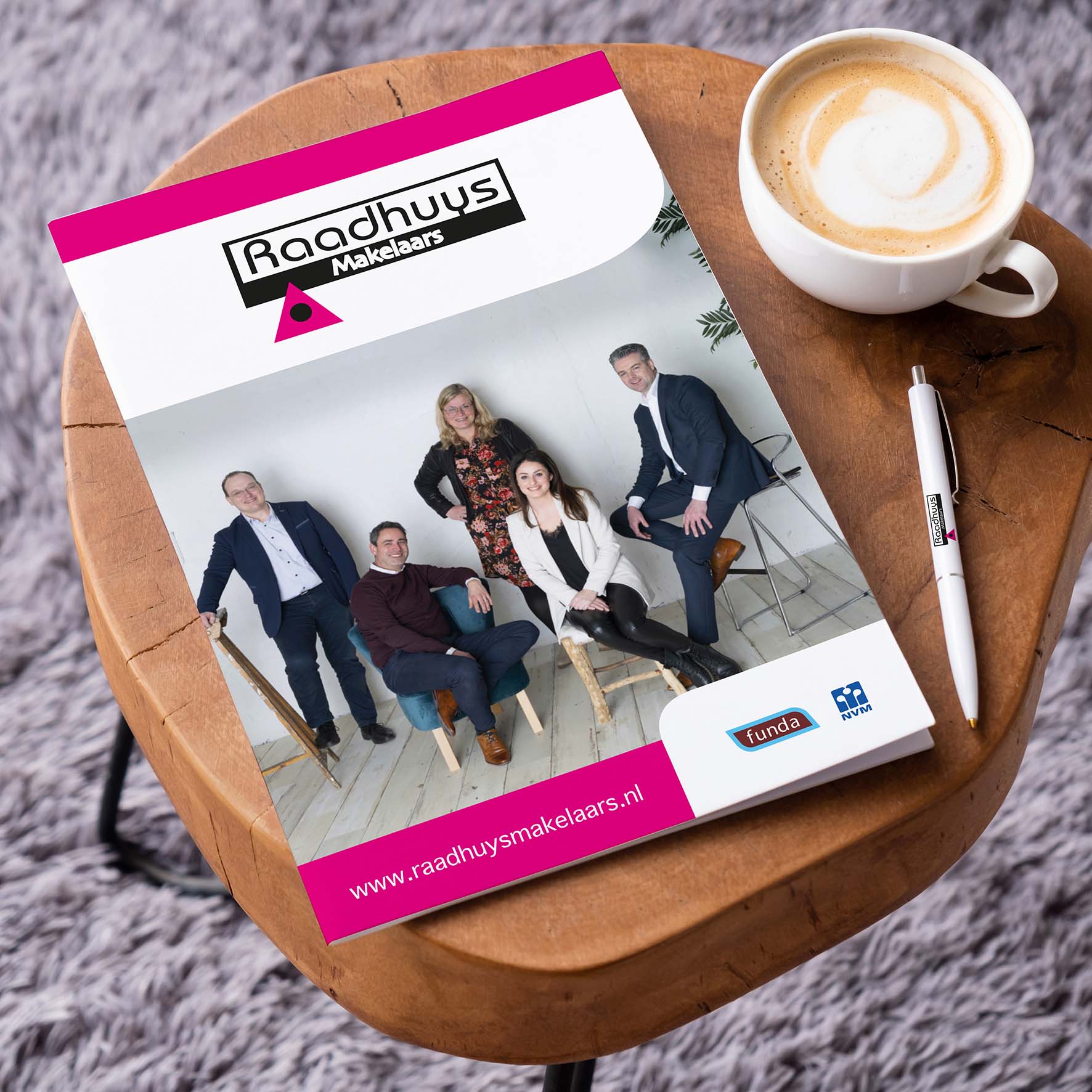 blank magazine mockup on coffee table with cappuccino, pen and grey rug